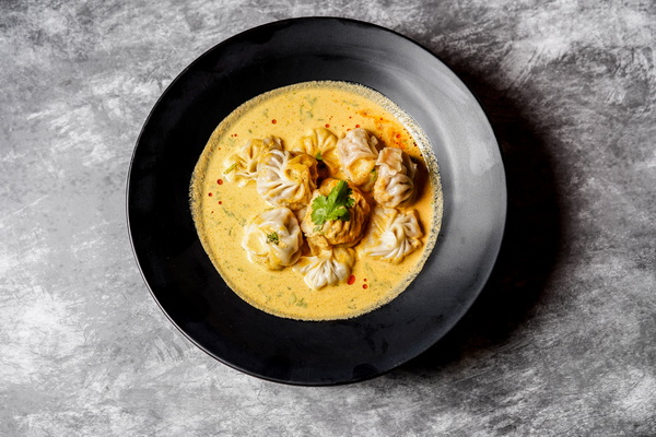 Jhol Momo in spiced broth